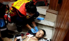 Brahim Aouissaoui khi vừa gây án và bị bắn Ảnh: NYPost