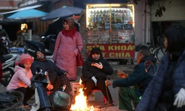 Cuộc sống đảo lộn của người lao động Thủ đô trong ngày lạnh nhất từ đầu mùa