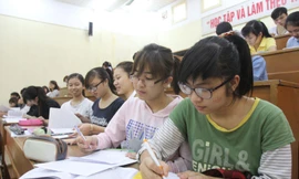 Sinh viên Đại học Quốc gia Hà Nội trên giảng đường. ảnh: hồng vĩnh