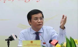 Tổng Thư ký Quốc hội trả lời báo chí tại buổi họp báo trước kỳ họp. Ảnh: Như Ý 