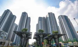 Doanh nghiệp bất động sản liên tục phát hành trái phiếu huy động vốn trong mùa dịch COVID-19. Người mua cần cân nhắc để tránh rủi ro. (Trong ảnh: Khu chung cư Goldmark City thuộc TNR Holdings Việt Nam). Ảnh: NM