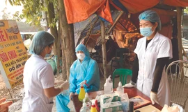 Trạm kiểm soát trước khi vào khu vực phong tỏa xã Sơn lôi 