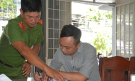 Đối tượng Đỗ Lê Vũ tại cơ quan công an 