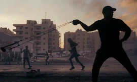 Người biểu tình Palestine đụng độ với binh lính Israel ở thành phố Ramallah thuộc Bờ Tây. (Ảnh: Washington Post)