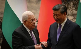 Tổng thống Palestine Mahmoud Abbas trong cuộc gặp Chủ tịch Trung Quốc Tập Cận Bình tại Bắc Kinh ngày 14/6. (Ảnh: Reuters)