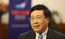 Phó Thủ tướng, Bộ trưởng Ngoại giao Phạm Bình Minh trả lời phỏng vấn báo chí sau khi Việt Nam trúng cử Ủy viên không thường trực của Hội đồng Bảo an Liên Hợp Quốc nhiệm kỳ 2020-2021. Ảnh: Như Ý