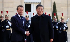 Tổng thống Pháp Emmanuel Macron đón tiếp Chủ tịch Trung Quốc Tập Cận Bình thăm Pháp ngày 25/3. 