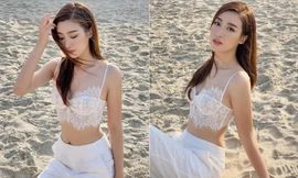 Không cần bikini, Đỗ Mỹ Linh vẫn đẹp hút hồn trên biển với áo crop-top xuyên thấu