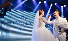Mai Quốc Việt và vợ trong lễ cưới.