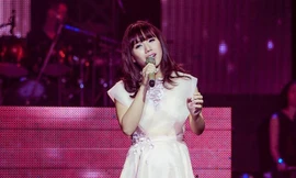 Bất ngờ xinh đẹp, ca sĩ Thùy Chi bị nghi 'dao kéo'