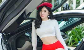 Vẻ ngoài 'nóng bỏng' của bạn gái Quang Lê