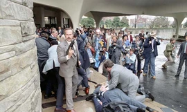 Nhóm vệ sĩ đặc nhiệm kịp thời “ra tay” trong vụ mưu sát Tổng Thống R. Reagan cuối tháng 3-1981.