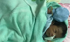 Bé trai sơ sinh bị chôn sống: Khi được bế lên bé cất tiếng khóc