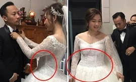 Hình ảnh trong lễ cưới khiến vợ Tiến Đạt vướng nghi vấn cưới chạy bầu.