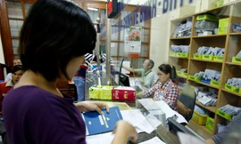 Lương ngành bảo hiểm bằng 1,8 lần công chức bình thường. Ảnh Như Ý