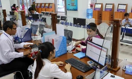 Nhiều bộ, địa phương cho biết sau khi sáp nhập các đơn vị đã tinh giản hàng nghìn biên chế.