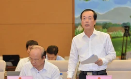 Bộ trưởng Bộ Xây dựng Phạm Hồng Hà tại phiên giải trình. Ảnh Hoàng Quỳnh