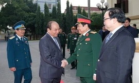 Thủ tướng Chính phủ tới dự lễ kỷ niệm 73 năm ngày thành lập Quân đội nhân dân Việt Nam, 28 năm ngày hội quốc phòng toàn dân và 45 năm ngày chiến thắng “Hà Nội - Điện Biên Phủ trên không”. Ảnh: CP