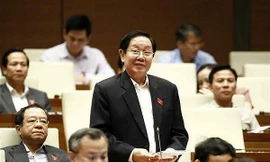 Bộ trưởng Nội vụ Lê Vĩnh Tân từng trả lời chất vấn đại biểu Quốc hội về việc bổ nhiệm chức danh Hàm.