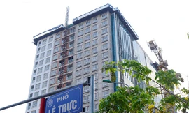 Tòa nhà vi phạm “không thể phá đi vì dân đã mua rồi”