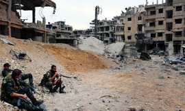 Binh sĩ Syria được nhìn thấy tại Douma, Đông Ghouta, vào ngày 28/3 vừa qua. Ảnh: Global Look Press