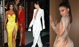 Chị em Kardashian diện đầm xẻ cao, 'thả rông' vòng 1 đi dự tiệc