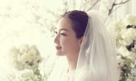 Cô dâu Choi Ji Woo xinh đẹp, rạng rỡ trong trang phục cô dâu. Ảnh: YG
