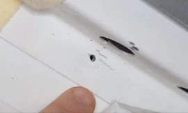 Hình ảnh vết thủng được phát hiện trên tàu vũ trụ Soyuz MS-09 của Nga, kết nối với trạm không gian NASA từ tháng 6. Ảnh: NASA.