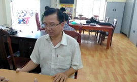 Nguyễn Văn Hòa (áo trắng).