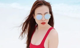 Người yêu Cường Đô La khoe ảnh áo tắm đỏ rực giữa tin đồn kết hôn