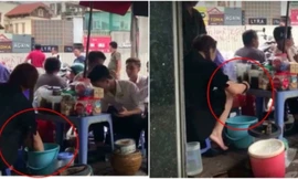 Hình ảnh cắt từ clip rửa chân trong chậu nước pha trà.