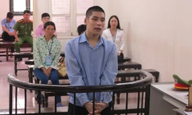 Lý Văn Minh trước vành móng ngựa.