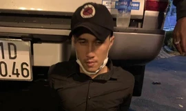 Trương Tín bị bắt khi đang ngồi trong quán cà phê sau khi gây án.