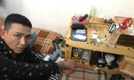 Thành cùng số ma tuý và súng ngắn khi bị bắt.