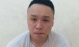 Tạ Khắc Huy tại công an.