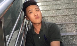 Trần Mai Xuân Thiện tại cơ quan công an.