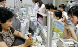 Nợ xấu ai mua? Ảnh: Hồng Vĩnh