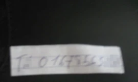 Mảnh giấy ghi tên và số điện thoại của 1 "cò". Ảnh: Bee.net