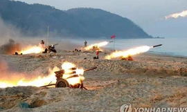 Hình ảnh về cuộc tập trận được đăng tải trên tờ Rodong Shimun của Triều Tiên số ra ngày 21/12.