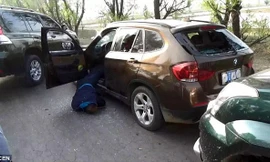 Một nghi phạm bị bắn chết trong xe BMW