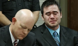 Daniel Holtzclaw (bên phải) khóc khi nghe tòa tuyên án hôm 21/1