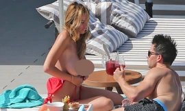 Mỹ nhân 'ngực khủng' phơi nắng vòng 1, say sưa trò chuyện với bạn trai