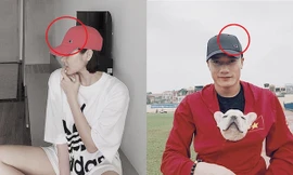 Bảo Anh và Bùi Tiến Dũng sử dụng hai chiếc mũ giống nhau nhưng khác màu.