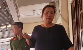 Bà Nga tại cơ quan công an. Ảnh: Zing