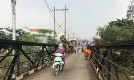 Cầu Long Kiểng thông xe sau hơn 10 ngày sửa chữa.