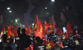 Người dân xuống đường ăn mừng chiến thắng của U23 Việt Nam. Ảnh: Mạnh Thắng