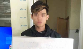 Quàng Trí Thành tại cơ quan điều tra.