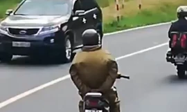 Chắp hai tay sau lưng khi chạy xe xuống đèo Prenn