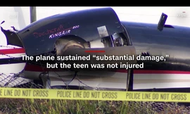 Chiếc King Air 200 bị hư hại sau khi đâm vào hàng rào sân bay. Ảnh: CNN.