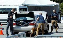 Bắt một phụ nữ Trung Quốc mang malware vào CLB của Tổng thống Trump